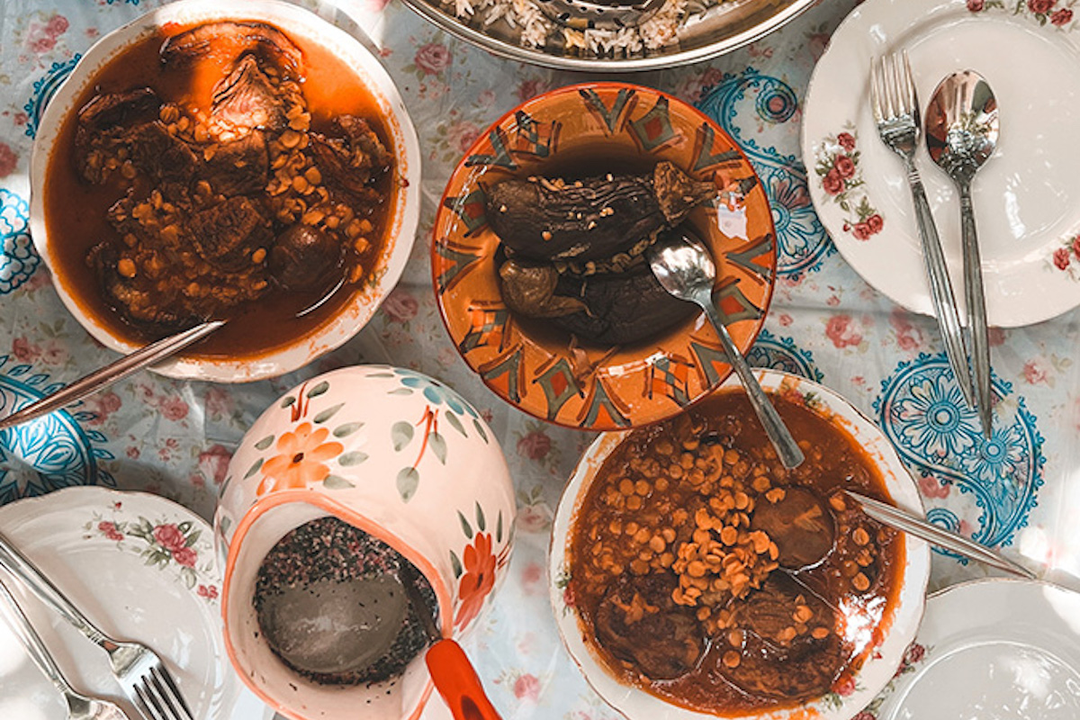 Two bowls of Gheymeh, meat and lentil stew.